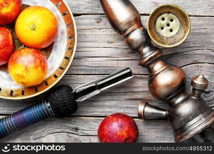 oriental hookah with orange taste. arabic nargile tobacco with the flavor of red orange