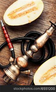 Oriental hookah with the aroma melon for relax.Melon shisha. oriental shisha with melon
