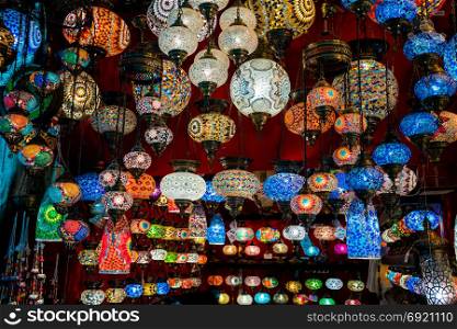 oriental lamps on a bazaar. traditional handmade lamps in souvenir shop