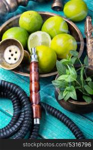 oriental nargile with lime. hookah with a tobacco flavor of a mixture of lime and peppermint