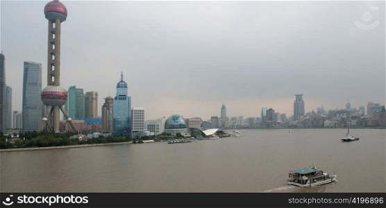 Oriental Pearl Tower and city skyline, Huangpu River, Pudong, Shanghai, China