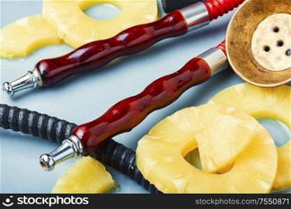 Oriental smoking hookah. Hookah tobacco with aroma of ananas.Pineapple hookah.. Pineapple flavored hookah.