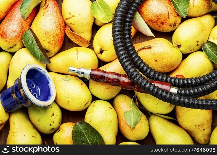 Oriental smoking hookah with pear.Fruit tobacco taste. Turkish shisha with pear