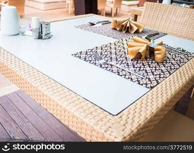 Oriental style dining table with traditional napkins