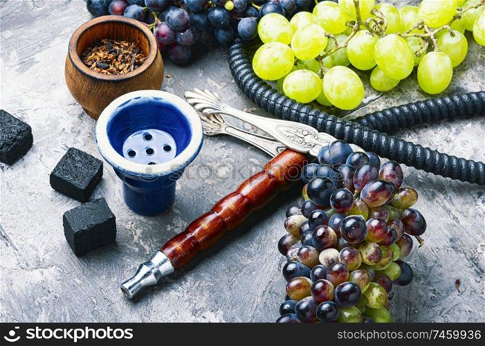 Oriental tobacco shisha with grapes aroma.Kalian with berry. Hookah with grapes flavor