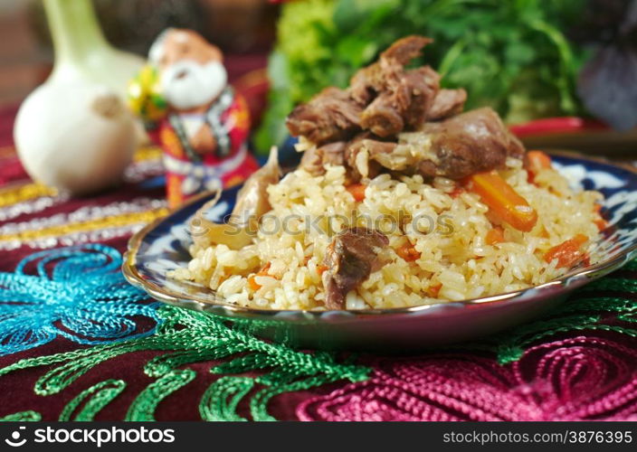 Oriental Uzbek pilaf . Central Asian cuisine