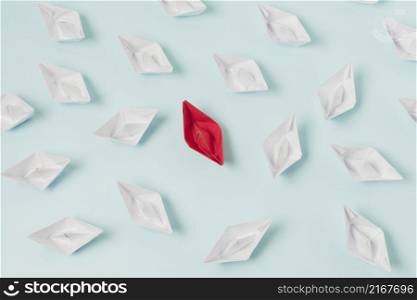 origami boats representing leadership concept