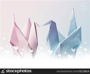 Origami couple paper crane with heart