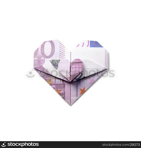 origami heart of banknotes. origami heart of banknotes on a white background
