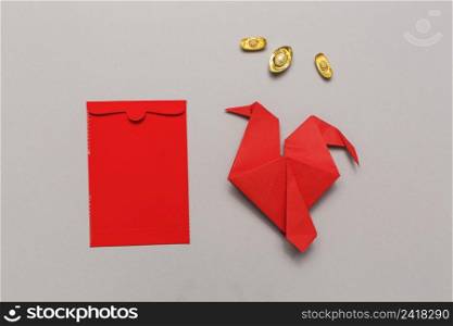 origami near red envelope
