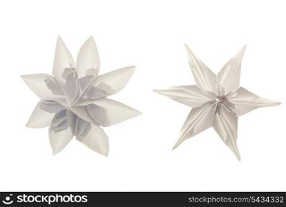 Origami white snowflakes from paper isolated on white