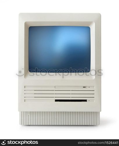 Original classic computer of eighties, front, isolated on white