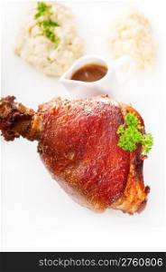 original German BBQ pork knuckle served with mashed potatoes and sauerkraut isolated on white ,MORE DELICIOUS FOOD ON PORTFOLIO