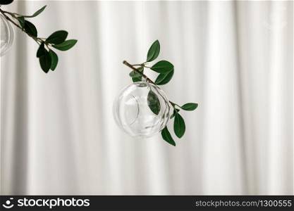 Original wedding floral decoration in the form of mini-vases and bouquets of flowers hanging from the ceiling.. Original wedding floral decoration in the form of mini-vases and bouquets of flowers hanging from the ceiling