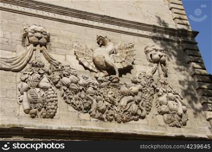 Ornament on facade of Conservatoire de Musique, previously the Pope&rsquo;s treasury in Avignon