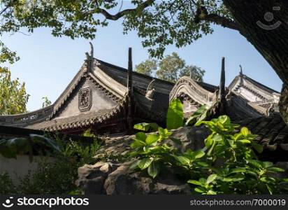 Ornamental rock garden in Yu or Yuyuan Garden in  the old city of Shanghai. Rocks in Yuyuan or Yu Garden in Shanghai