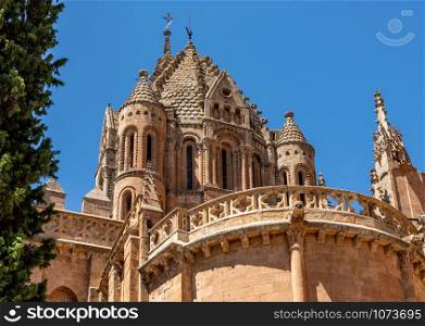Ornate carvings and bell tower of the Old Cathedral in Salamanca. Ornate carvings on roof of the Old Cathedral in Salamanca