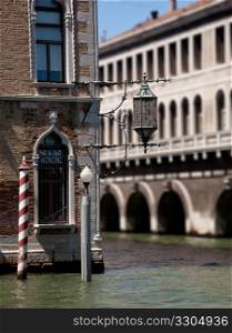 Ornate light over canal in Venice