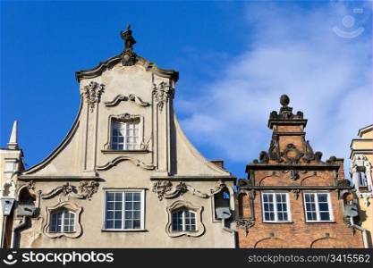 Ornate top of a tenement houses in the Old Town of Gdansk, Poland