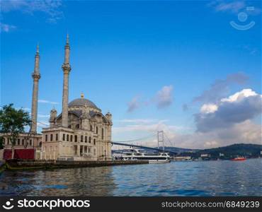 OrtakAy Mosque and Bosphorus bridge in Istanbul Turkey