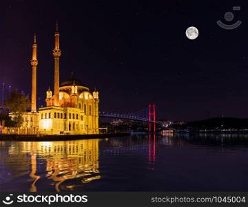 Ortakoy Mosque at night, moonlight view in Istanbul, Turkey.. Ortakoy Mosque at night, moonlight view, Istanbul, Turkey