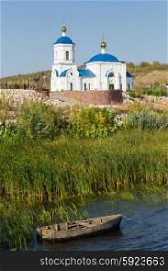 Orthodox Church on the shore of the river