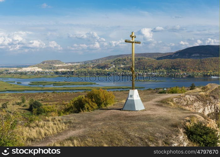 Orthodox cross on top of a hill