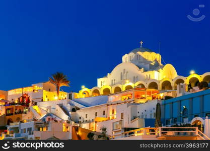 Orthodox Metropolitan Cathedral of Fira, modern capital of the Greek Aegean island, Santorini, during twilight blue hour, Greece