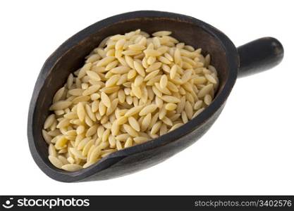 orzo (rosa marina), a rice shaped pasta made of wheat semolina on a rustic wooden scoop isolated on white