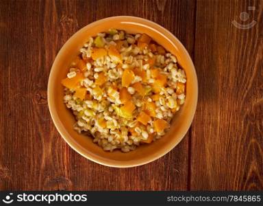 Orzotto con zucca - Barley porridge with pumpkin .hearty cuisine