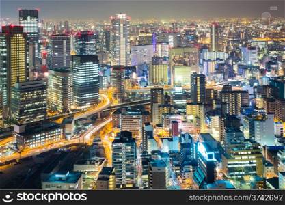 Osaka skyline and skyscraper building at night Japan