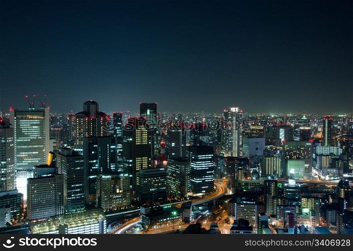 Osaka Skyline at night. Skyline of Osaka City in Japan at night with lots of lights
