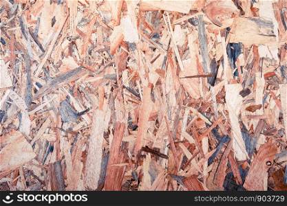 OSB boards are made of brown wood chips sanded, for backdrop and background