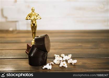 oscar statuette film popcorn . Resolution and high quality beautiful photo. oscar statuette film popcorn . High quality and resolution beautiful photo concept