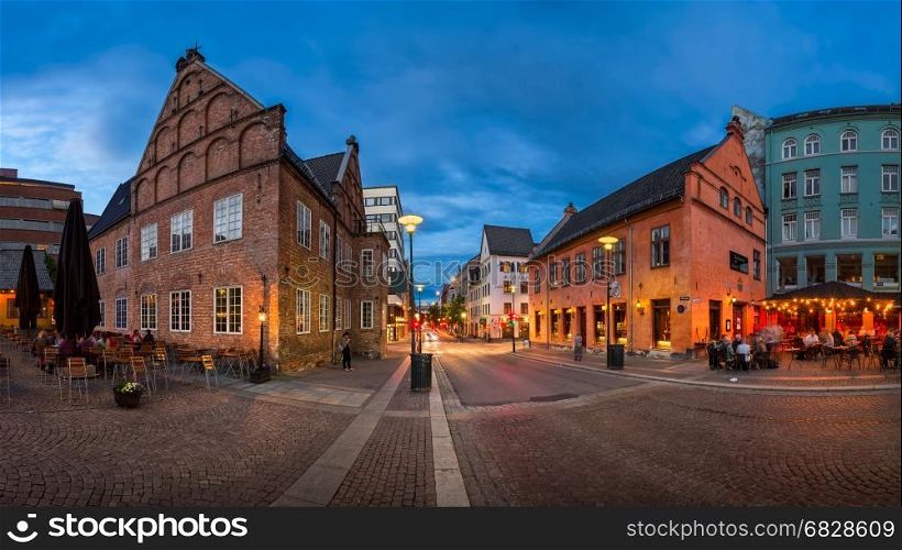 OSLO, NORWAY - JUNE 12, 2014: Christiania Torv in the Evening. King Christian IV decided to rebuild the city after fire in 1624. He pointed to this spot and said - the new town will lie here!