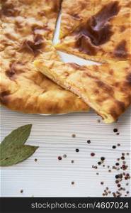 Ossetian baked pie. Ossetian baked pie with cheese and salmon fish