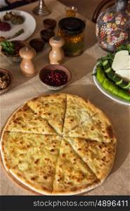 Ossetian baked pie. Ossetian baked pie with cheese and salmon fish