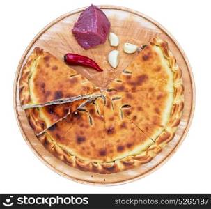 ossetian pie on a white. Meat ossetian pie on a white background