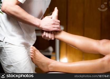 Osteopathy Treatment on Patient’s Leg. Leg Pain Osteopathy Treatment.