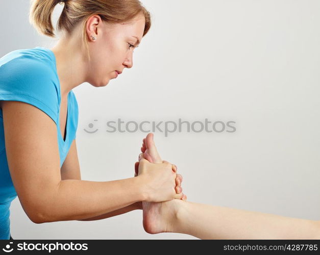 Osteopathy treatment, the professional masseuse and her patient