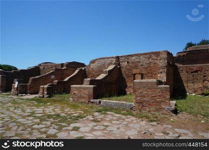 Ostia Antica ancient city commercial buildings. Rome - Italy