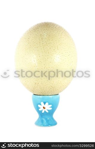 Ostrich egg for breakfast isolated on white