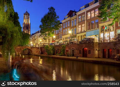 Oudegracht canal in night illumination at sunset. Utrecht. Netherlands.. Utrecht. The city's main channel.