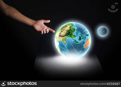 Our Earth planet. Close up of human hand holding Earth planet. Elements of this image are furnished by NASA