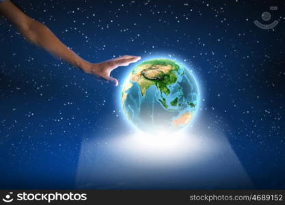 Our Earth planet. Close up of human hand holding Earth planet. Elements of this image are furnished by NASA