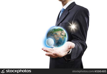 Our home planet. Close up of businessman holding Earth planet in palm. Elements of this image are furnished by NASA