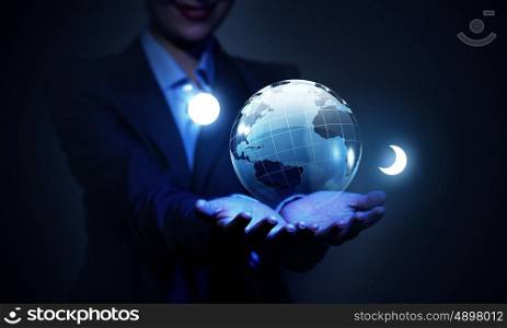 Our technology world. Close view of businessman showing digital Earth planet