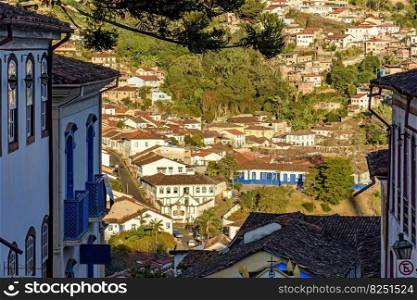 Ouro Preto city in Minas Gerais with its facades of old colonial houses during the late afternoon. Ouro Preto city in Minas Gerais with its old colonial houses