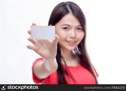 Out of focus Chinese woman holding up business card, left blank for copy space
