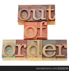 out of order - isolated phrase in vintage wood letterpress printing blocks